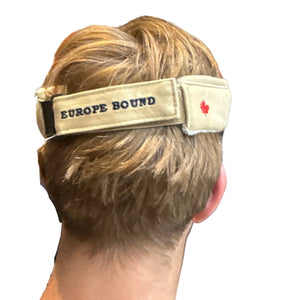 Europe Bound Explorer Cotton Visor in Khaki on a Blond Model's Head Showing  Rear Adjustable Features and embroidered brand and Canada Flag | ScoutTech Outfitters Mississauga Store