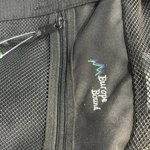 Europe Bound Heavy Duty Mesh Duffle Bags in Black Close Up of Europe Bound Brand Logo and Side Pocket Zipper  | ScoutTech Outfitters