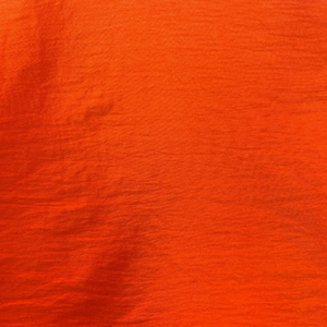 Close-up of a bright orange fabric used to construct Europe Bound hammocks | ScoutTech Outfitters