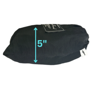 A black soft-sided bag or pouch shown on a white background with a cyan measurement arrow indicating a height of 5 inches. A small sewn Europe Bound  Parachute Hammock label is visible near the top, and a small white tag appears on the right side indicating one person size. | ScoutTech Outfitters 
