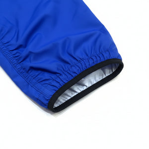 Europe Bound Unisex Waterproof Breathable Raincoats with Stash Pocket in Blue Elasticized Cuffs Close-Up | ScoutTech Outfitters Mississauga Store