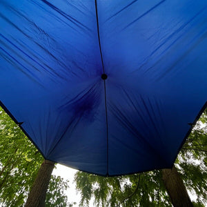 Europe Bound Universal Rain Tarp Dark Blue Set Up in a Forest Inside View | ScoutTech Outfitters
