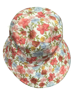 Floral-patterned bucket hat on a dark surface