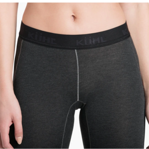 Kuhl Women's Akkomplice Dark gray leggings with a visible brand logo on a model | ScoutTech Outfitters