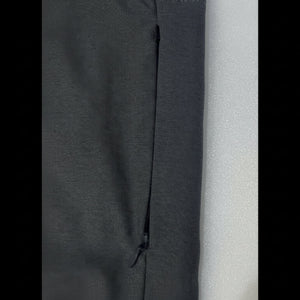 Kuhl Women's Trekr Kapri Bottoms in Grey Close Up View of Hidden Right Calf Zipper Pocket | ScoutTech Outfitters