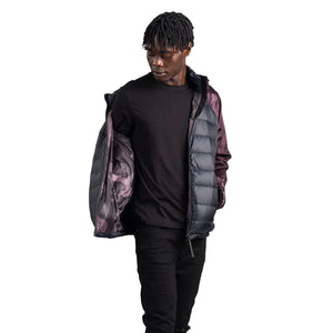 Outdoor Survival Canada Men's 0°C Kawartha Down Hybrid Jackets Fully Opened in a Playful Pose Purple Camo Sleeves and Black Body | ScoutTech Outfitters Retail Store