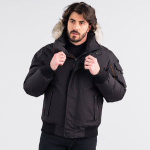 Outdoor Survival Canada OSC Men's Desna -40 Down Bomber Jackets in Orca Black Front Action Pose | ScoutTech Outfitters