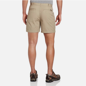 A person shown from the back wearing Royal Robbins Men's Classic Billy Goat Chino Shorts in Khaki, and a gray top | ScoutTech Outfitters Mississauga Store