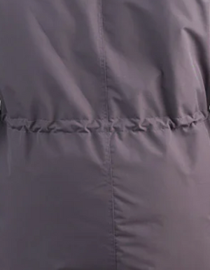 Close-up of a OSC Nyik jacket in CHarcoal Grey with visible stitching.