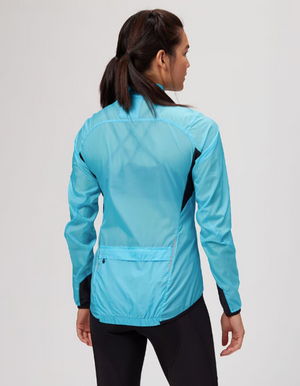 Sugoi Women's Stash Wind and Rain Cycling Jackets in Light Blue Backside View on Model | ScoutTech Outfitters Mississauga Store