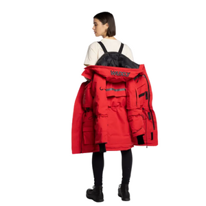 Wuxly Sabertooth II Unisex Vegan Expedition Parka in Red on Female Model Showing Carry Straps | ScoutTech Mississauga