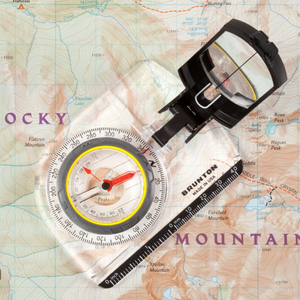 Brunton TruArc 7 Mirrored Sighting Compass Placed on Map Open | ScoutTech Outfitters Mississauga Store