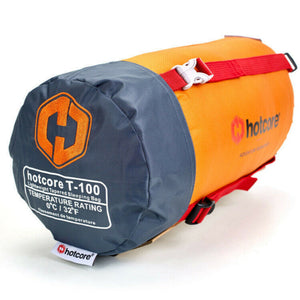 Hotcore T-100 0C/32F Tapered Sleeping Bag In compression stuff sack in orange and grey | ScoutTech Outfitters