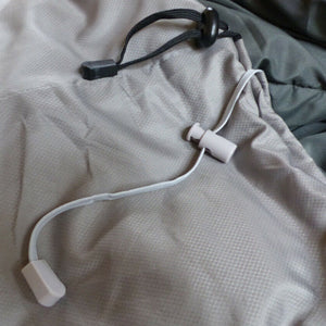 Hotcore T-100 0C/32F Tapered Sleeping Bag Interior in Grey and Showing Adjustment Dongles | ScoutTech Outfitters