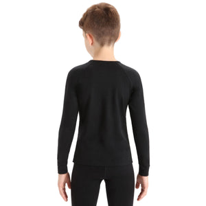 Icebreaker Merino Kids Oasis 200 Long Sleeve Crewe Thermal Top in Black for 6 to 14 years Back View on Model | ScoutTech Outfitters