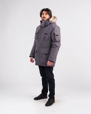 Outdoor Survival Canada OSC Men's Atka -40 Down Parka in Charcoal Grey on Model with Left Side View | ScoutTech Outfitters Mississauga