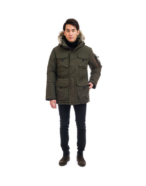 Outdoor Survival Canada OSC Men's Atka -40 Down Parka in Alpine Moss Green Front View on Model with Hand in Left Pocket | ScoutTech Outfitters