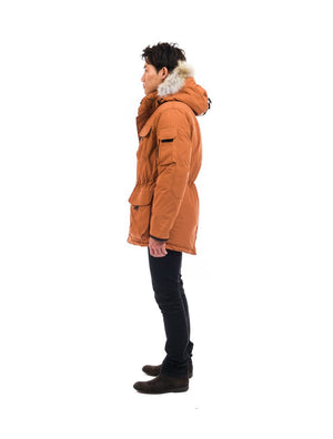 Outdoor Survival Canada OSC Men's Atka -40 Down Parka in Copper Creek Orange Left Side View on Model | ScoutTech Outfitters