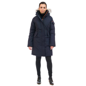 Outdoor Survival Canada OSC Women's Karima -40 Down Parka in Cold Lake Blue on a model showing Front View Partially Zipped | ScoutTech Outfitters