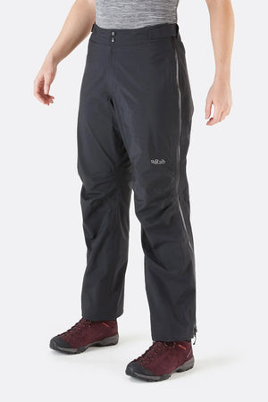 Rab Women's Kangri GTX Rain Pants in Black with Full Zipper Front View with RAB Logo | ScoutTech Outfitters Mississauga Store